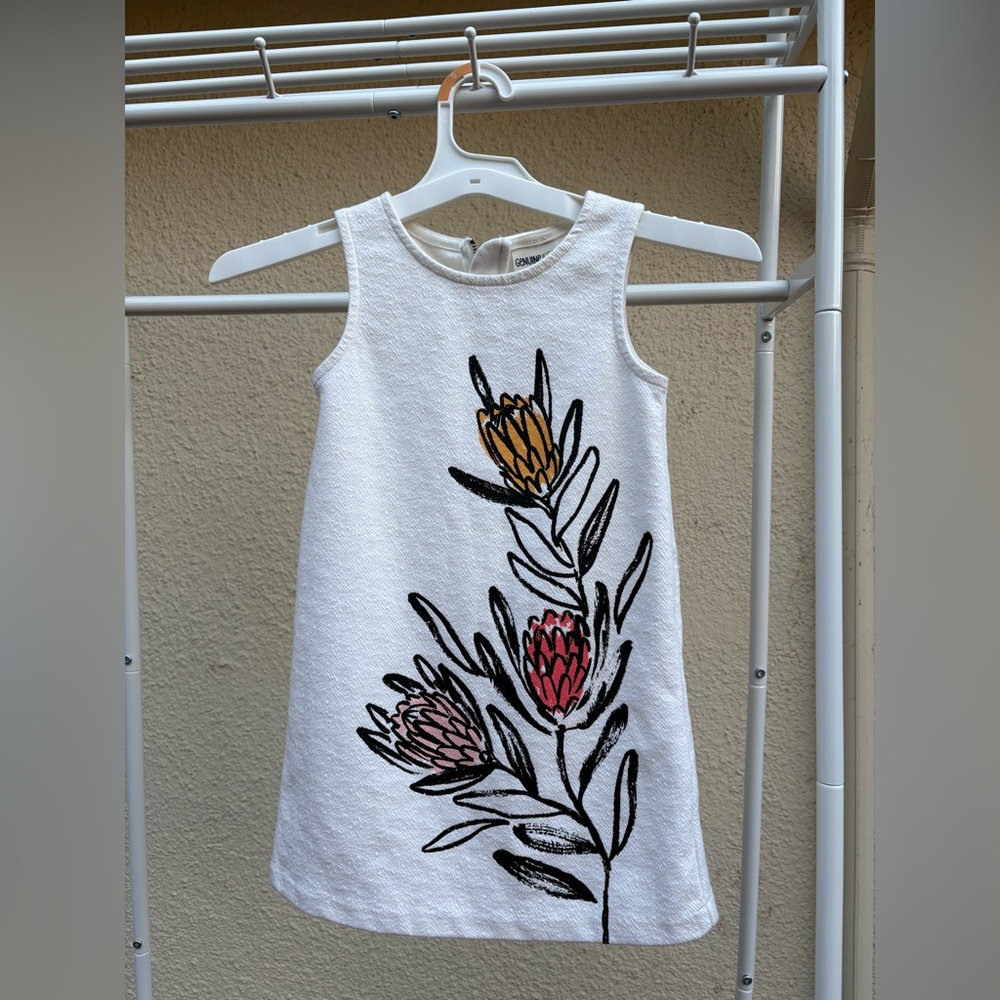 Charming White Dress with Floral Embroidery